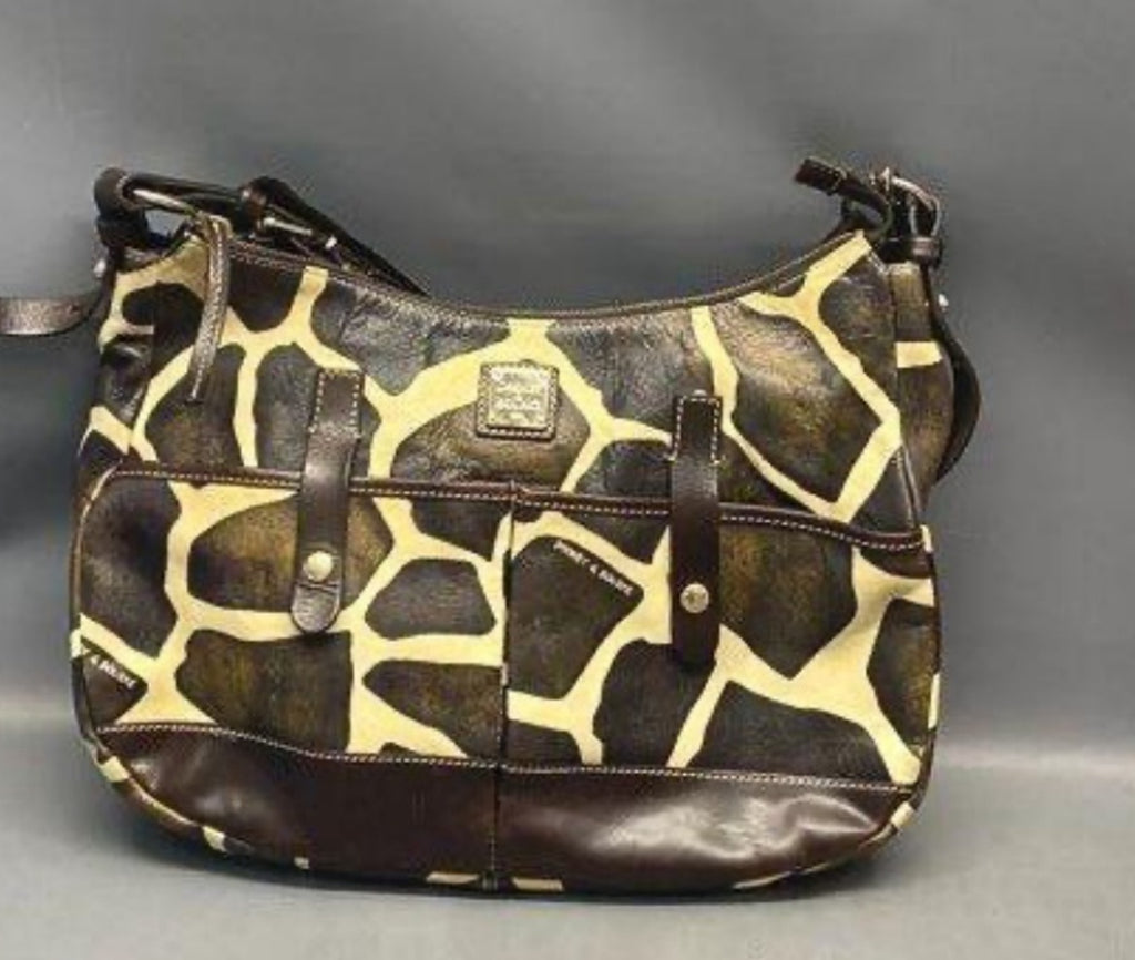 Dooney & Bourke giraffe pattern brown ivory shoulder bag clean front view