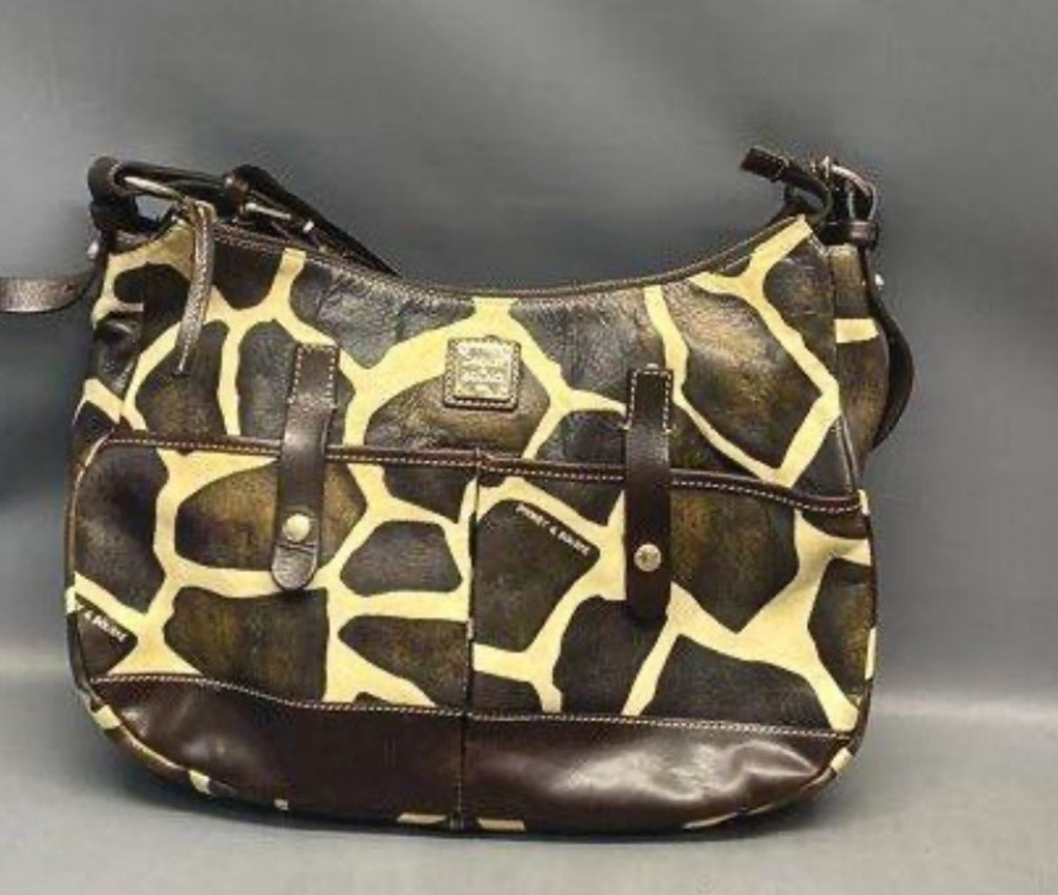 Dooney & Bourke giraffe pattern brown ivory shoulder bag clean front view