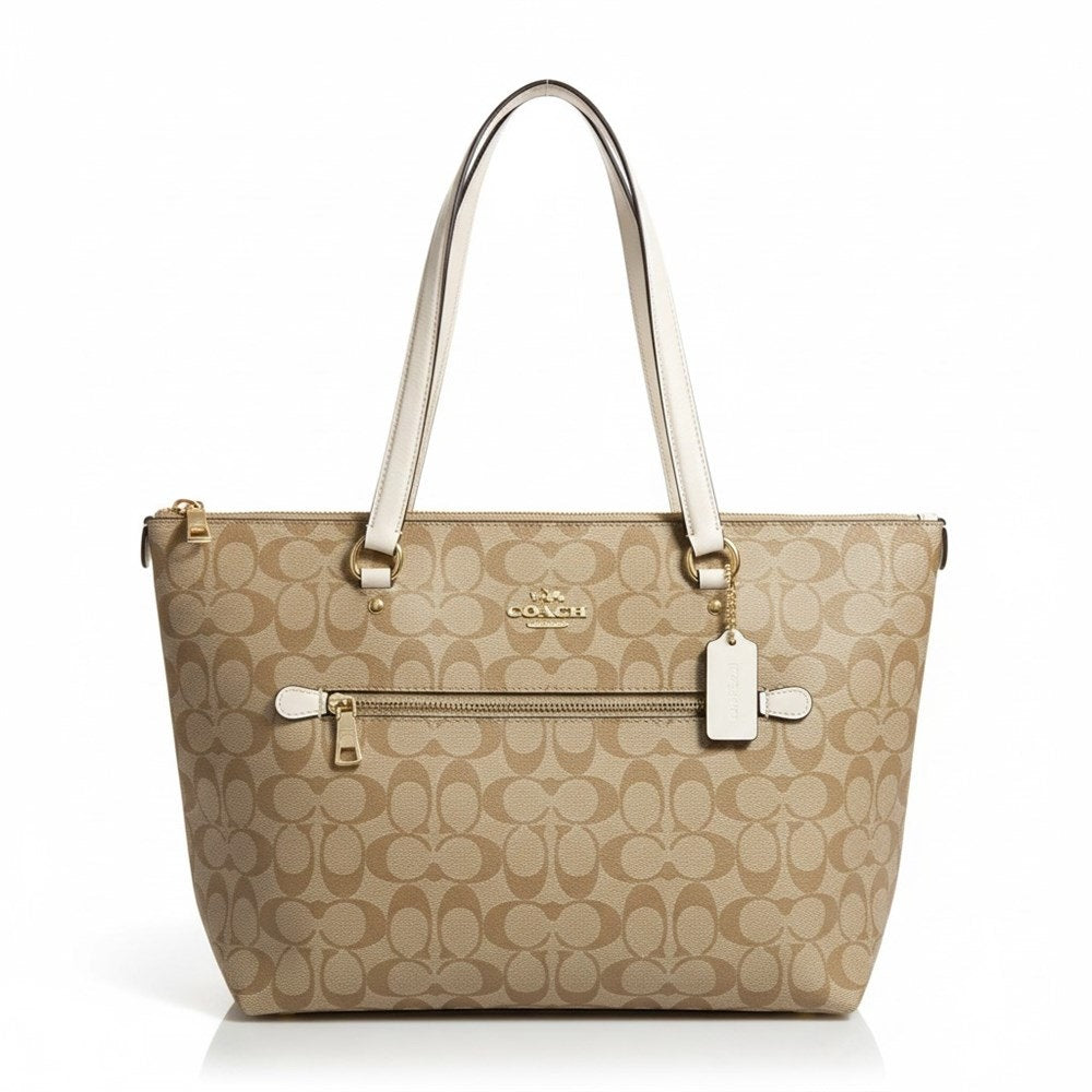 Authentic Coach Gallery Tote shoulder bag in khaki signature canvas with chalk leather trim and gold tone hardware