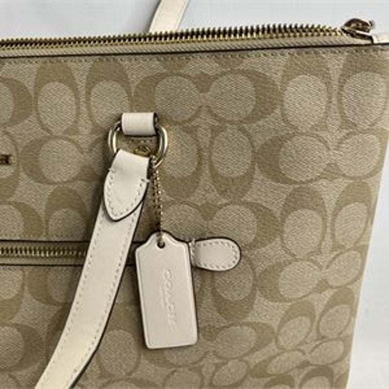 Authentic Coach Gallery Tote shoulder bag in khaki signature canvas with chalk leather trim and gold tone hardware