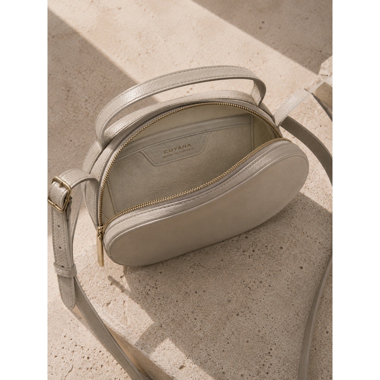 Cuyana Cream Leather Oval Zip Crossbody Bag Made in Turkey