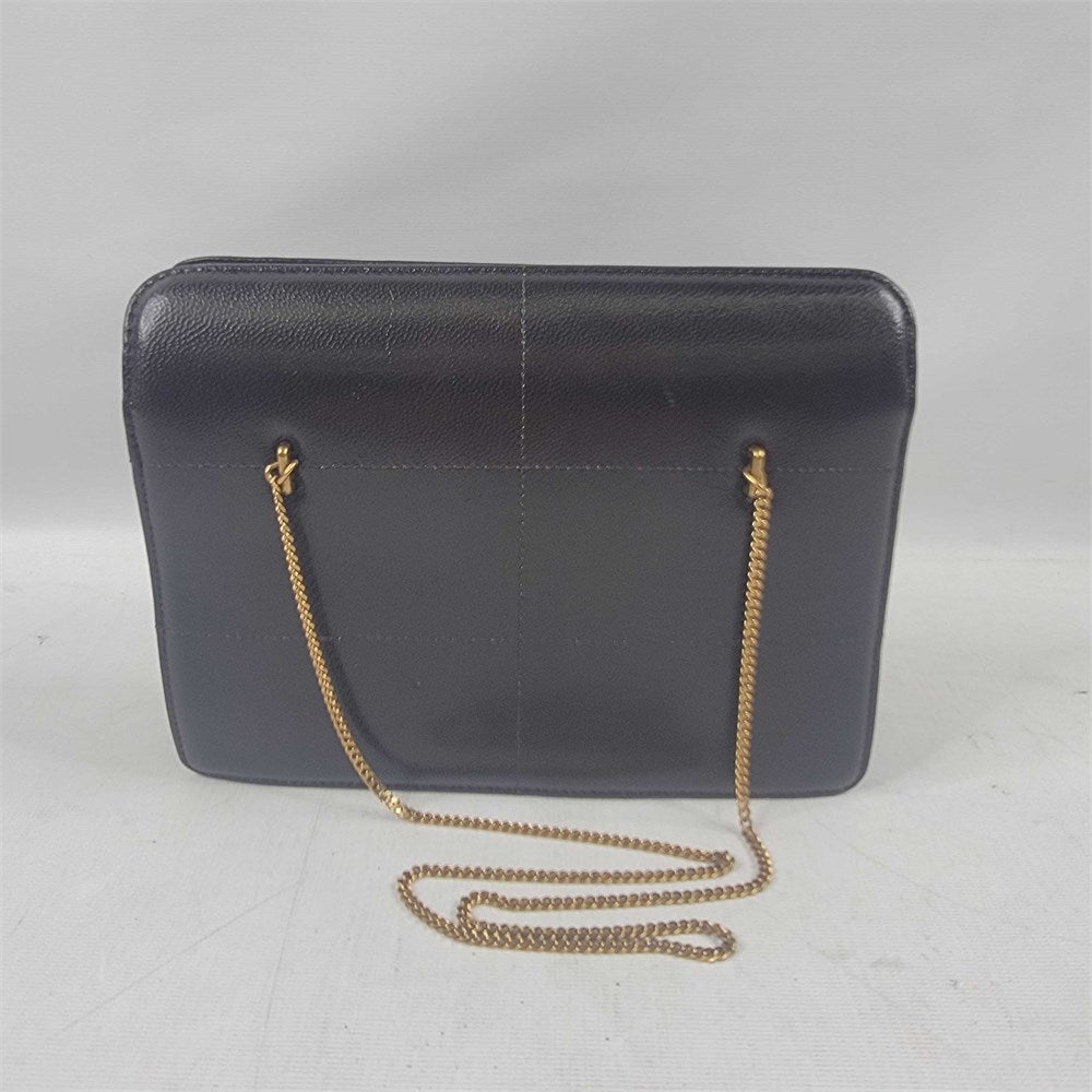 Black leather crossbody bag with gold-tone chain strap view 4