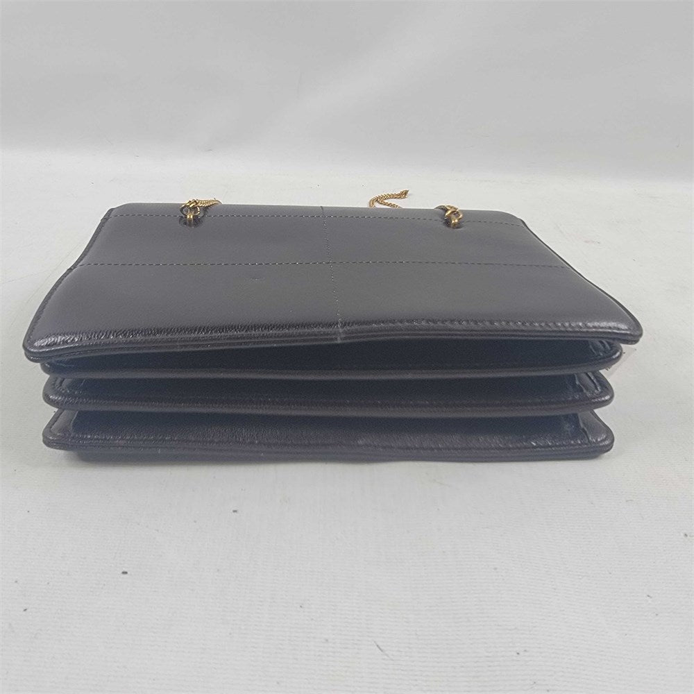 Black leather crossbody bag with gold-tone chain strap view 5