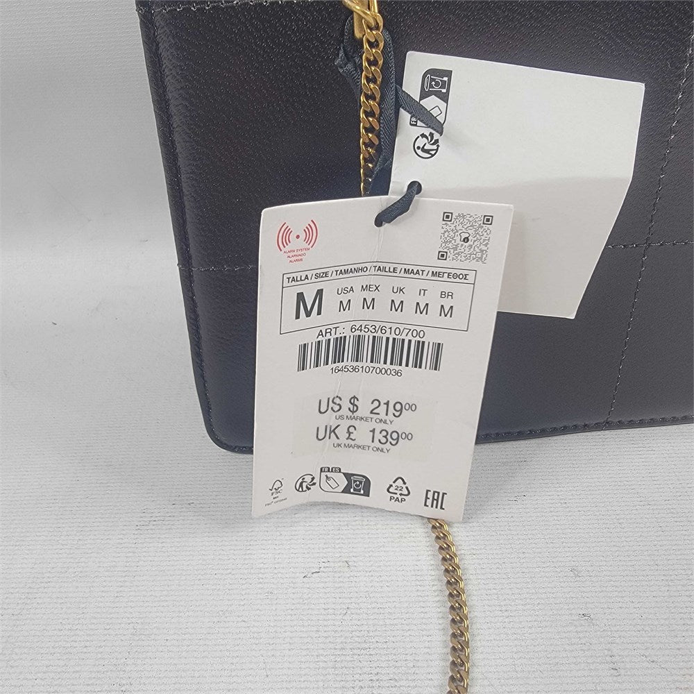 Black leather crossbody bag with gold-tone chain strap view 7