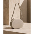 Cuyana Cream Leather Oval Zip Crossbody Bag Made in Turkey