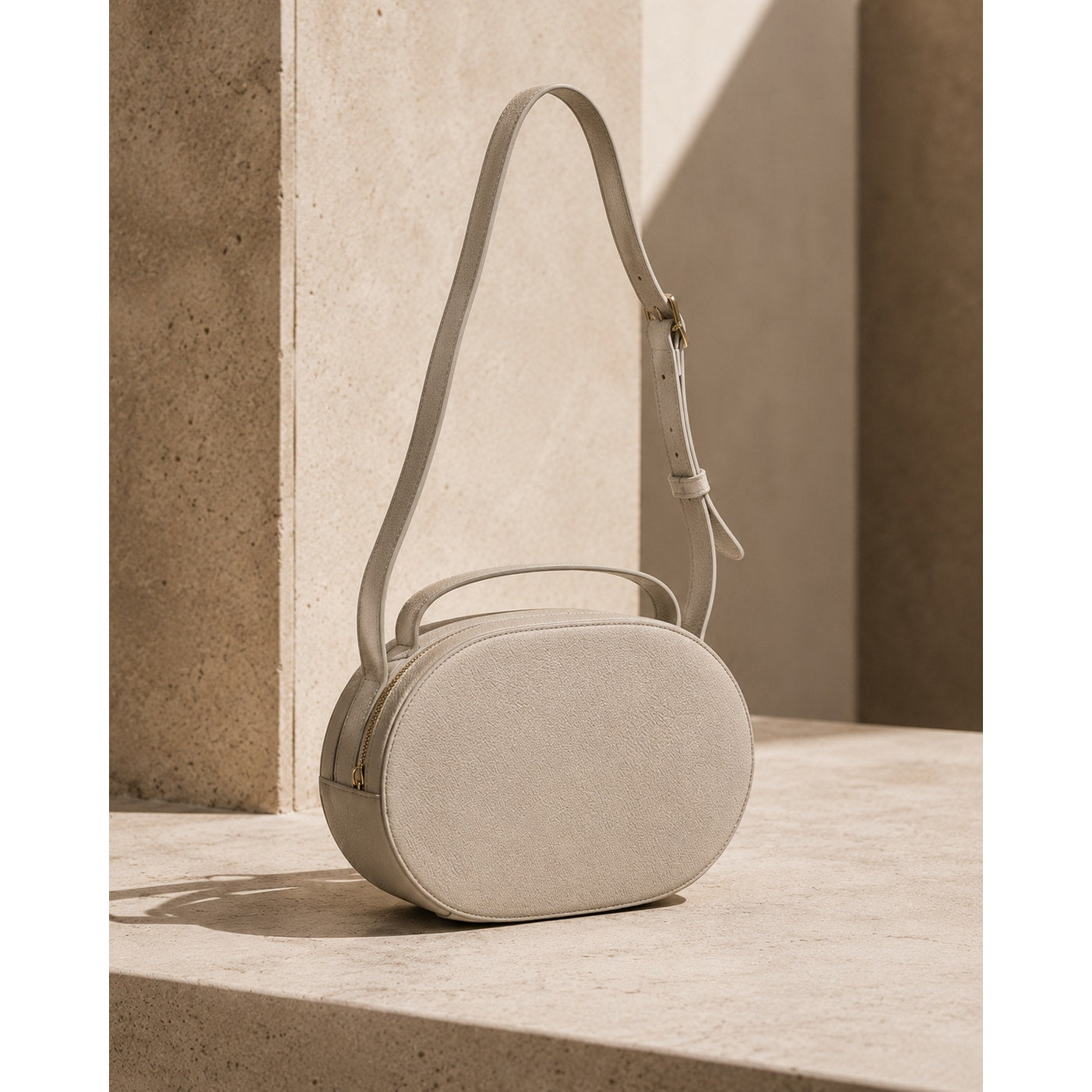 Cuyana Cream Leather Oval Zip Crossbody Bag Made in Turkey