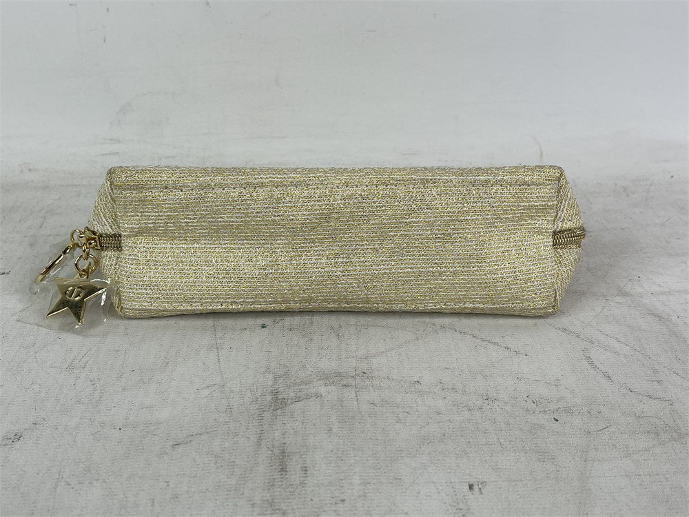 Christian Dior limited edition gold holiday cosmetic pouch bottom view