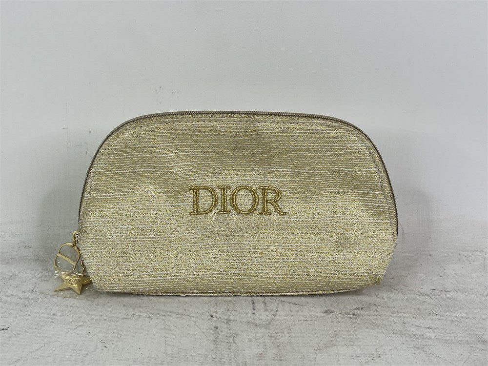 Christian Dior limited edition gold holiday cosmetic pouch front view
