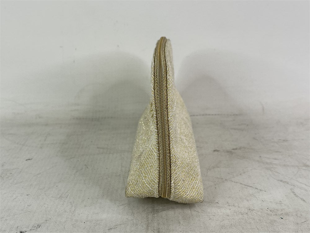 Christian Dior limited edition gold holiday cosmetic pouch side view