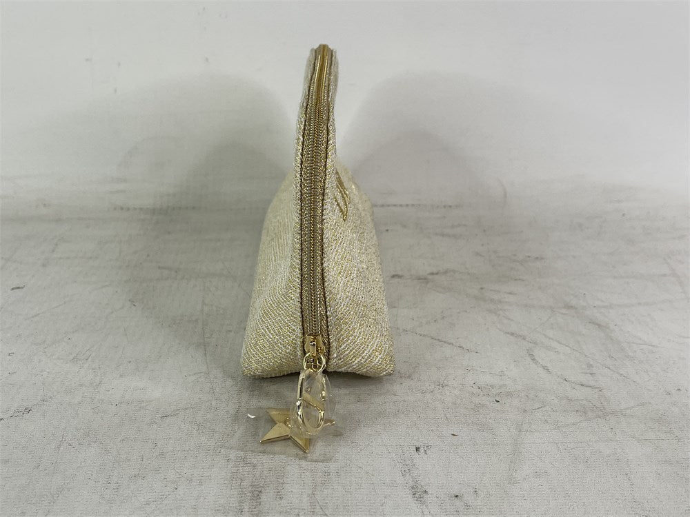Christian Dior limited edition gold holiday cosmetic pouch opposite side view