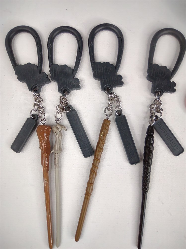 Harry Potter wand keychains source group; Accessory B is the second wand from the left