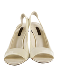 Louis Vuitton ivory patent leather slingback sandals front view