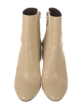 Saint Laurent beige leather ankle boots front view