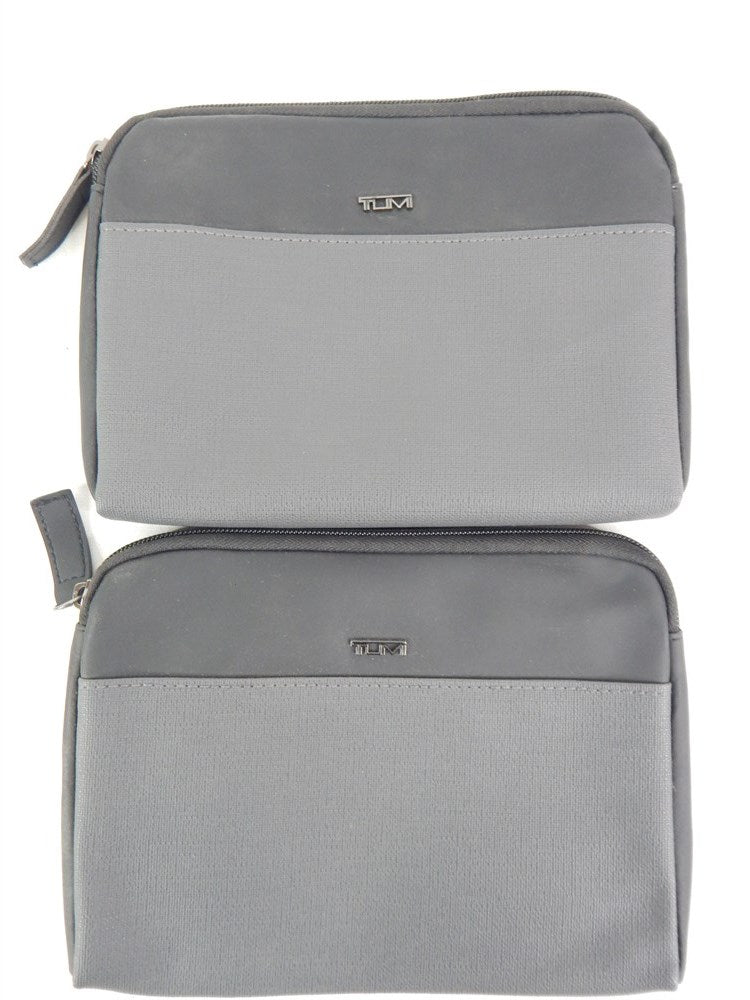 TUMI source subgroup with two black gray travel pouches, front view